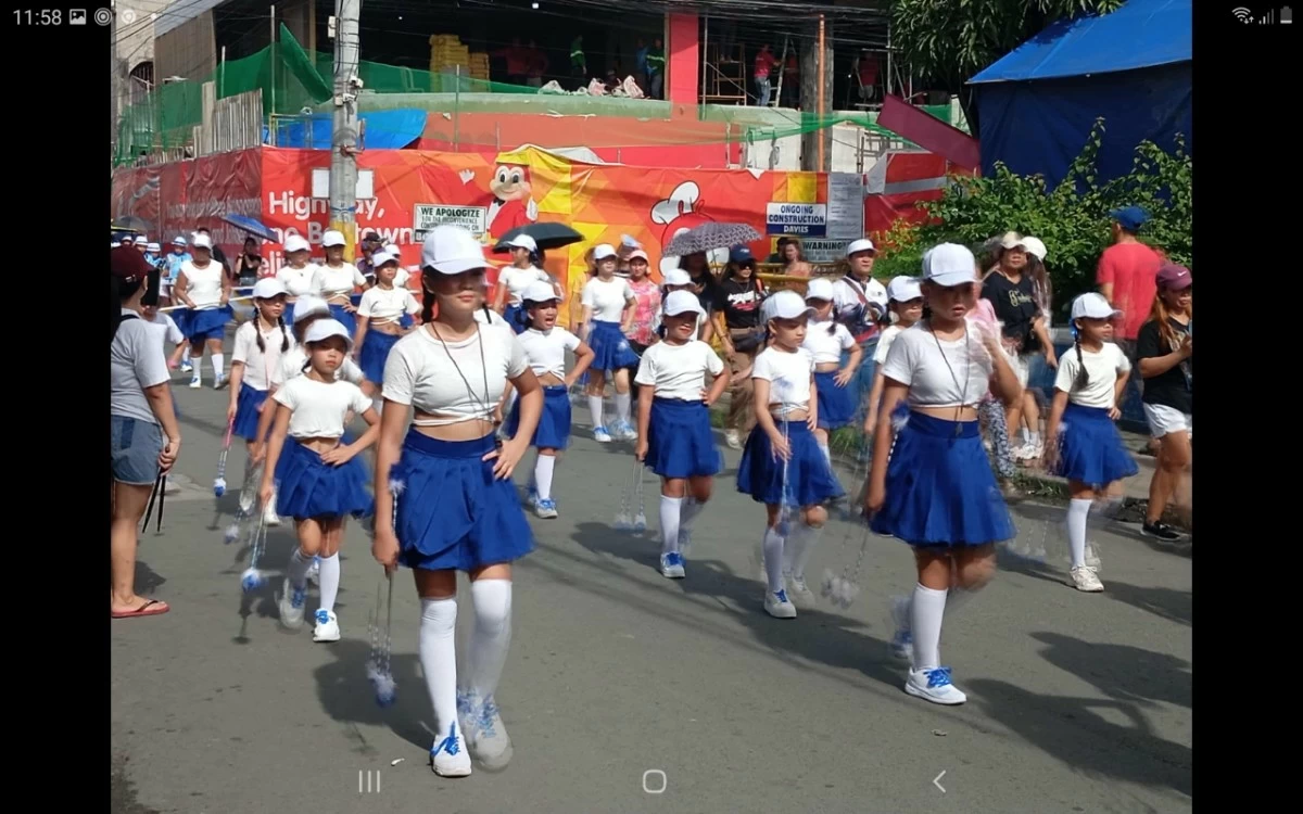 A drum and lyre group marches during the opening salvo parade and street dance competition in Binangonan, Rizal on Oct. 18 (photo by Nel Andrade)