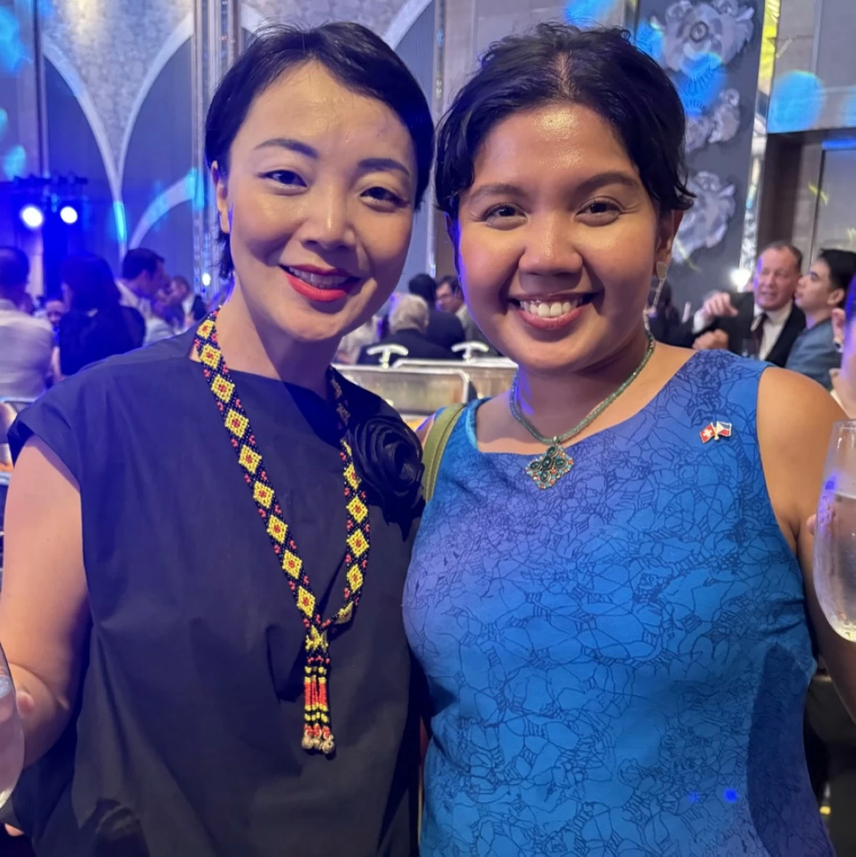 Hope Zhang of the Embassy of Brazil with Sofia Santelices of the Embassy of Switzerland

