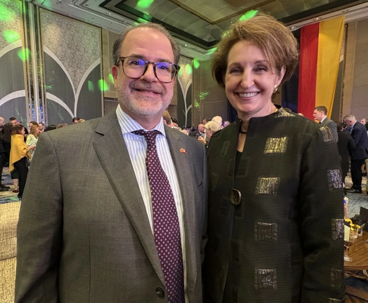 Ambassador David Bruce Hartman of the Embassy of Canada with Ambassador MaryKay Loss Carlson of the US Embassy  

