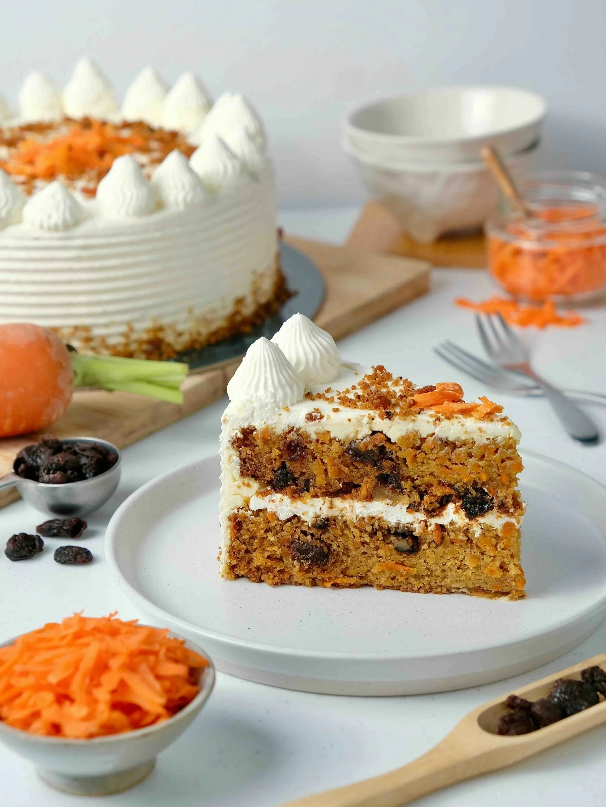 HOMESTYLE HARVEST The Carrot Walnut Raisin Cake is moist, nutty, and spiced just right—proof that comfort and tradition never go out of style.