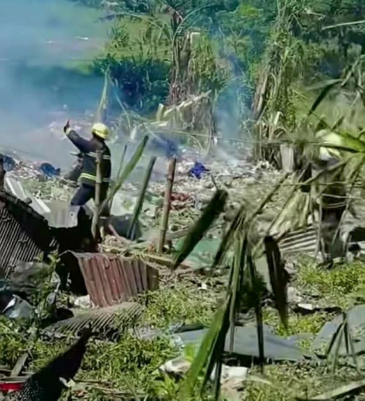 Firefighters try to put out the fire caused by an explosion at a small fireworks factory in Brgy. Partida, Norzagaray, Bulacan on Wednesday, Oct. 22, 2025. (Photo from Bulacan PNP)

