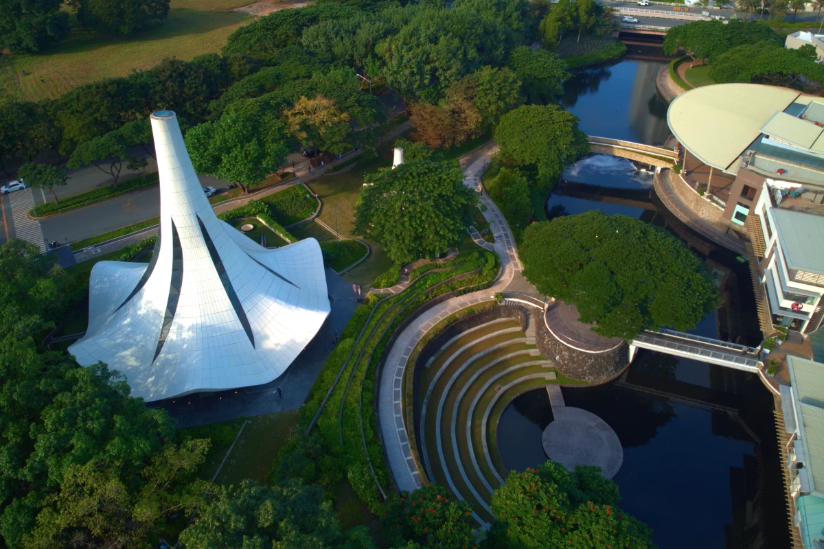 Aerial shot of Filinvest City’s River Park beside Our Lady of Lourdes Chapel, a vital waterway being cared for through ongoing dredging and preservation efforts.