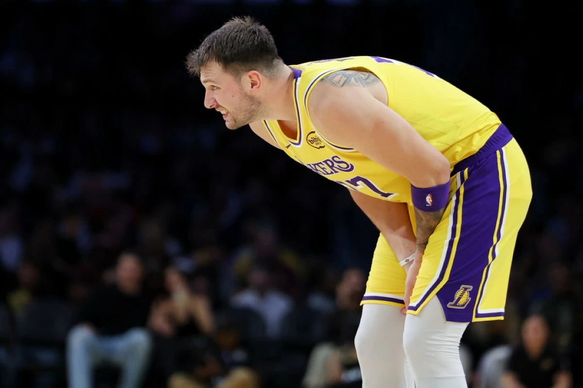 Los Angeles Lakers guard Luka Doncic reacts during the first half of an NBA basketball game against the Minnesota Timberwolves, Friday, Oct. 24, 2025, in Los Angeles. (AP Photo/Jessie Alcheh)