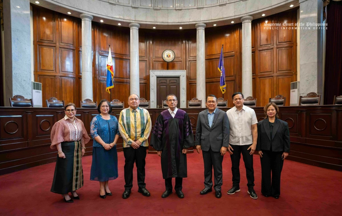 Chief Justice Alexander G. Gesmundo (center), joined by Supreme Court (SC) Associate Justices Japar B. Dimaampao (third from right) and Jose Midas P. Marquez (second from right), and Court Administrator Ma. Theresa Dolores C. Gomez-Estoesta (rightmost) with newly confirmed and appointed Deputy Court Administrators Leo T. Madrazo (third from left), Lilian C. Barribal-Co (second from left), and Rainelda H. Estacio-Montesa (leftmost), on Oct. 27, 2025, at the SC Session Hall in Manila. (Photo courtesy of the SC Communications Office)