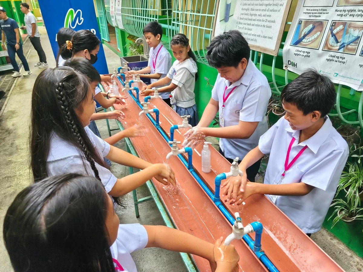 Students of Pamplona Elementary School Unit 1 participate in a group handwashing activity, highlighting the importance of hygiene and cleanliness during Global Handwashing Day.
