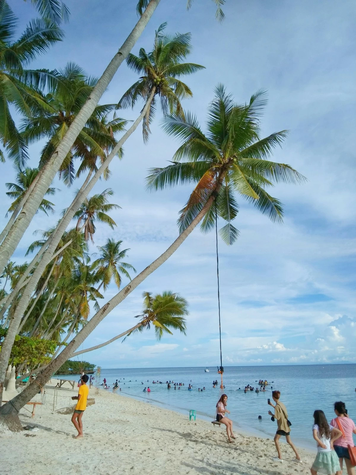 SWING TO ADVENTURE Siquijor's viral rope swing is perfect for beachside photos.
