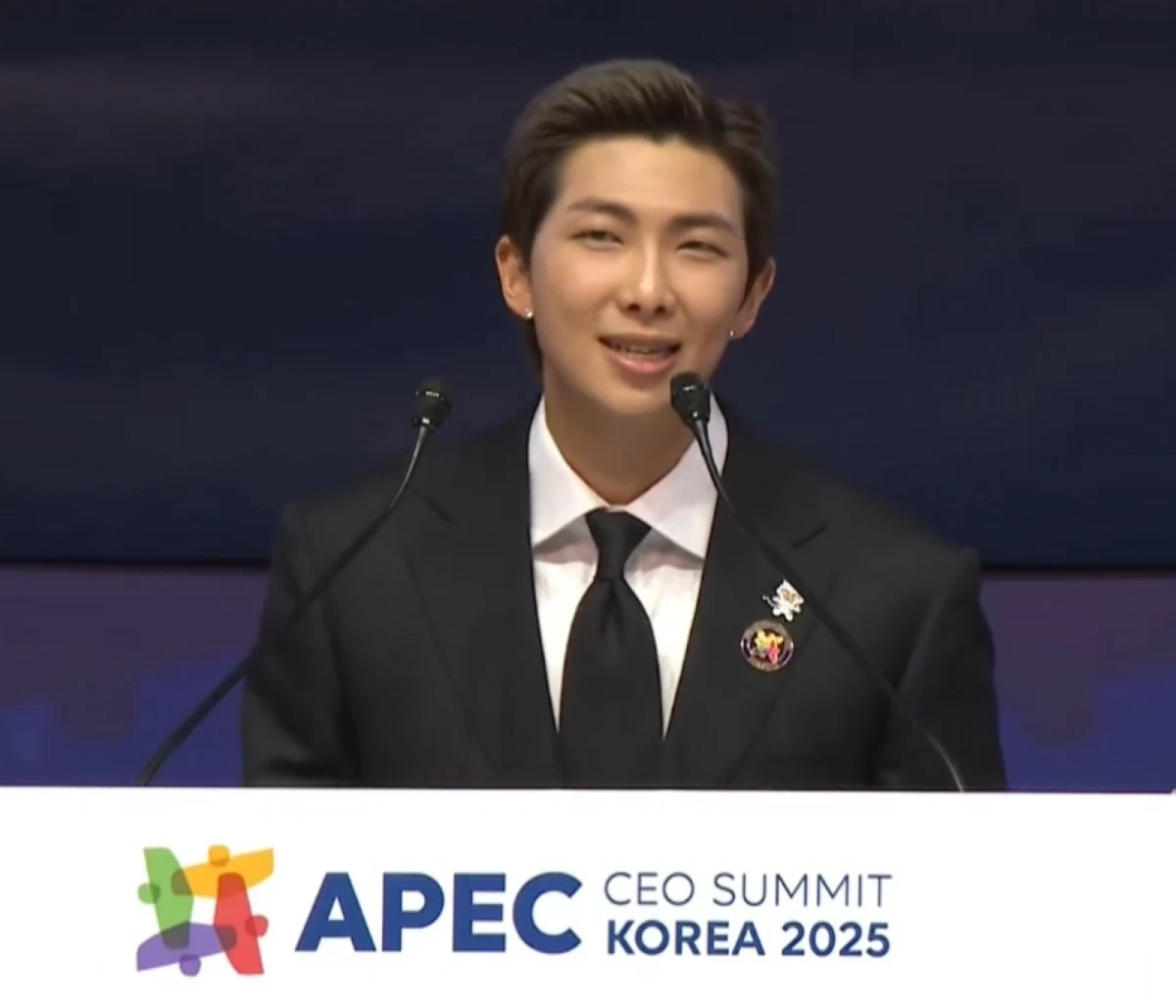 BTS' RM speaking at the APEC CEO Summit Korea 2025 on Oct. 29 at the Gyeongju Arts Center in Gyeongju, South Korea (Screenshot from KBS video on YouTube)