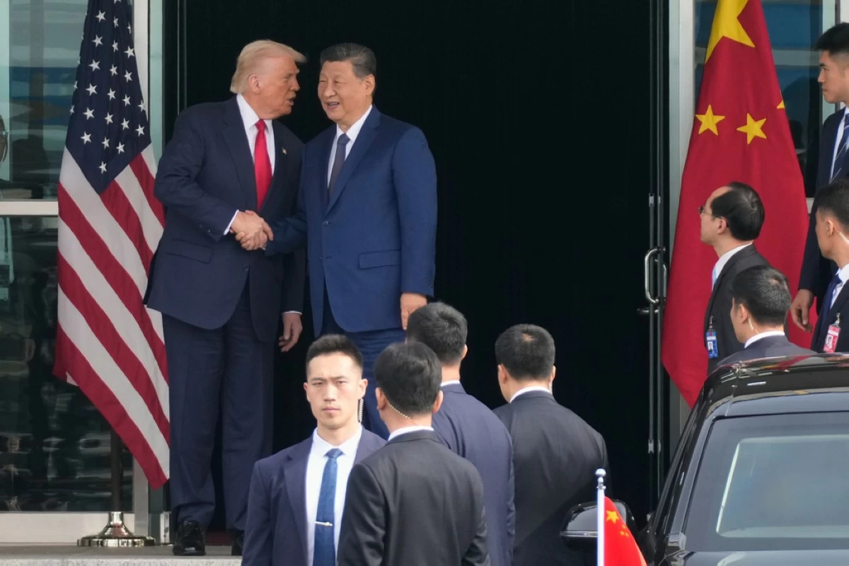 China's Xi promises to protect free trade at APEC as Trump snubs major summit