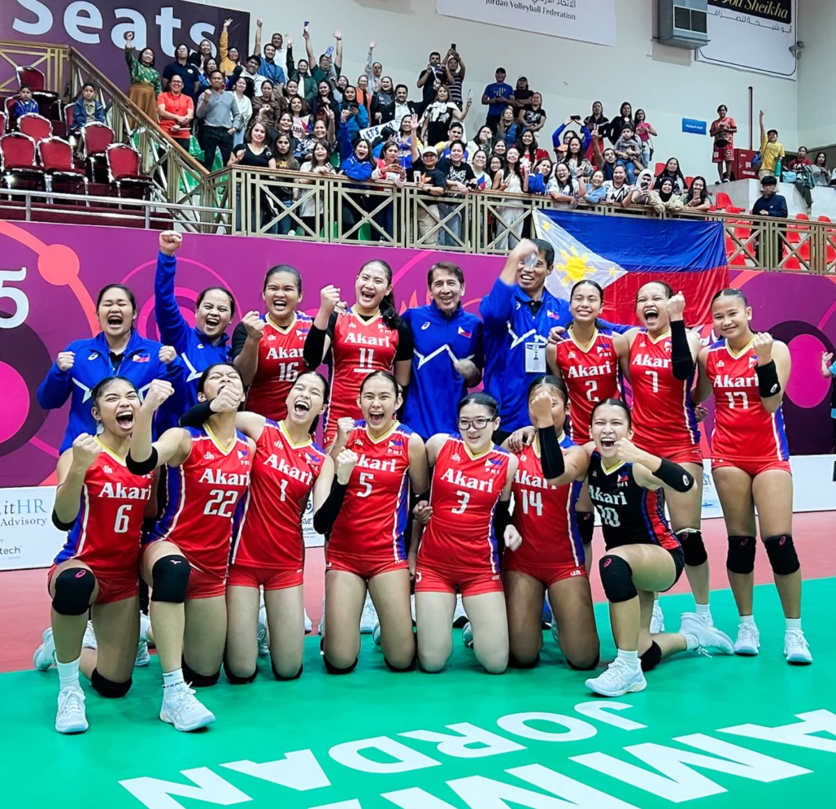 THE Alas Pilipinas girls team are a cheerful bunch—and so ar the Filipino fans in the background—after their victory over Iran. They are (front row, from lef) Nadeth Herbon, Megan Hernandez, Kimberly Peralta, Jhenica Sadia, Mischa Ambrocio, Princess Sajulga and Frances Ramos; and (back row, from (left) Hannah Grace De Luna (PT), Lerma Giron (assistant coach, Madele Gale, Xyz Rayco, Edwin Leyva (head coach), Oliver Balse (assistant Coach), Merish Beltran, Resty Jane Olaguir and Kristel Mirasol. (PNVF Photo)