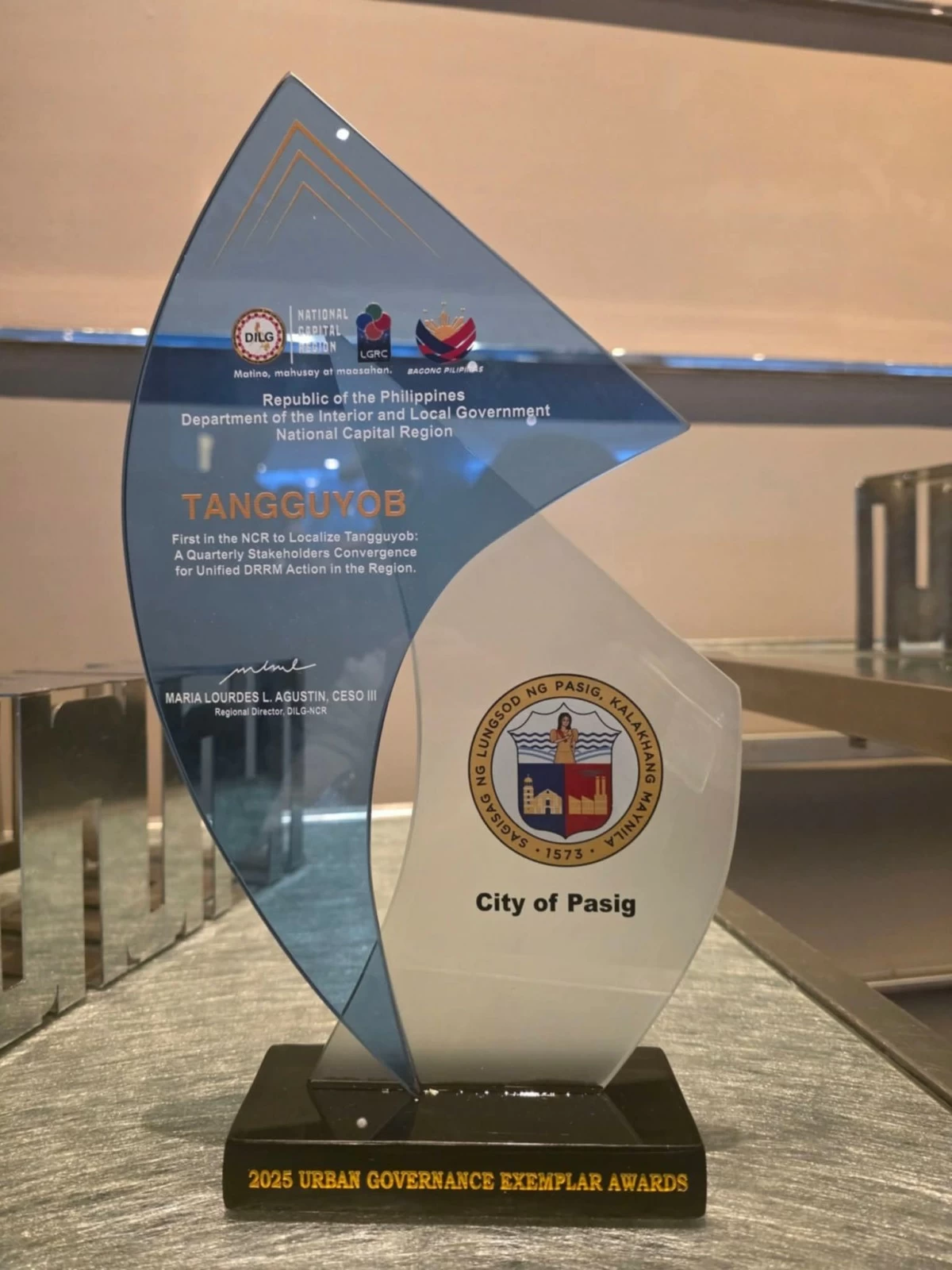 The plaque received by the Pasig City Disaster Risk Reduction and Management Office (DRRMO) from the DILG-NCR after being recognized as the first LGU in the NCR to localize the agency’s “Tangguyob.” (Photo from Pasig DRRMO)
