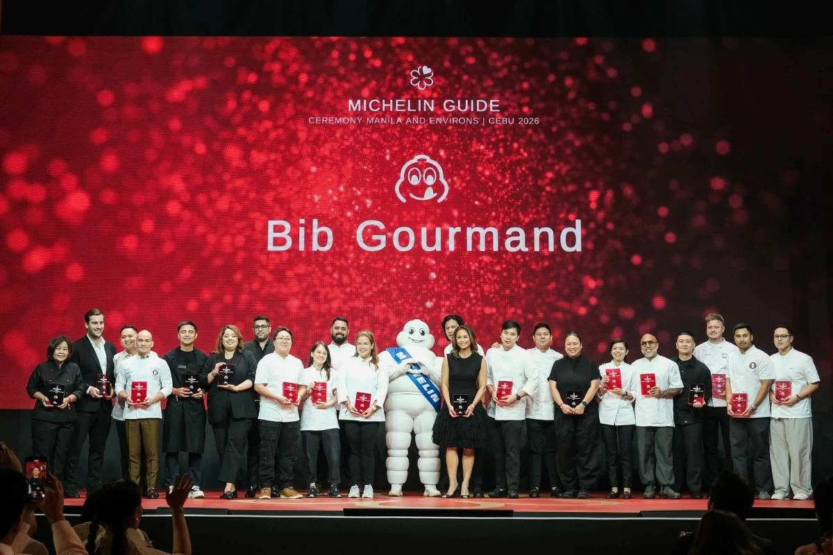 THE REAL CROWD-PLEASERS The Bib Gourmand awardees share a light moment with the Michelin Man during the Michelin Guide Philippines 2026 gala at the Manila Marriott Grand Ballroom