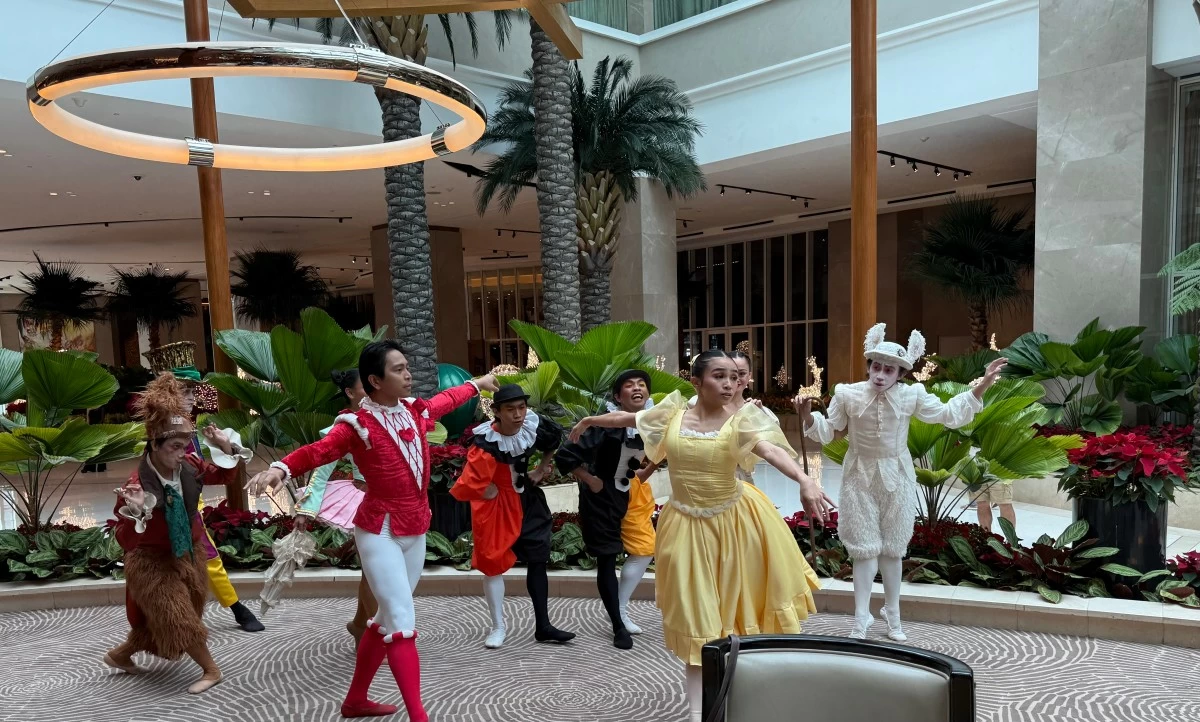 Dancing an excerpt from 'Alice in Wonderland.'