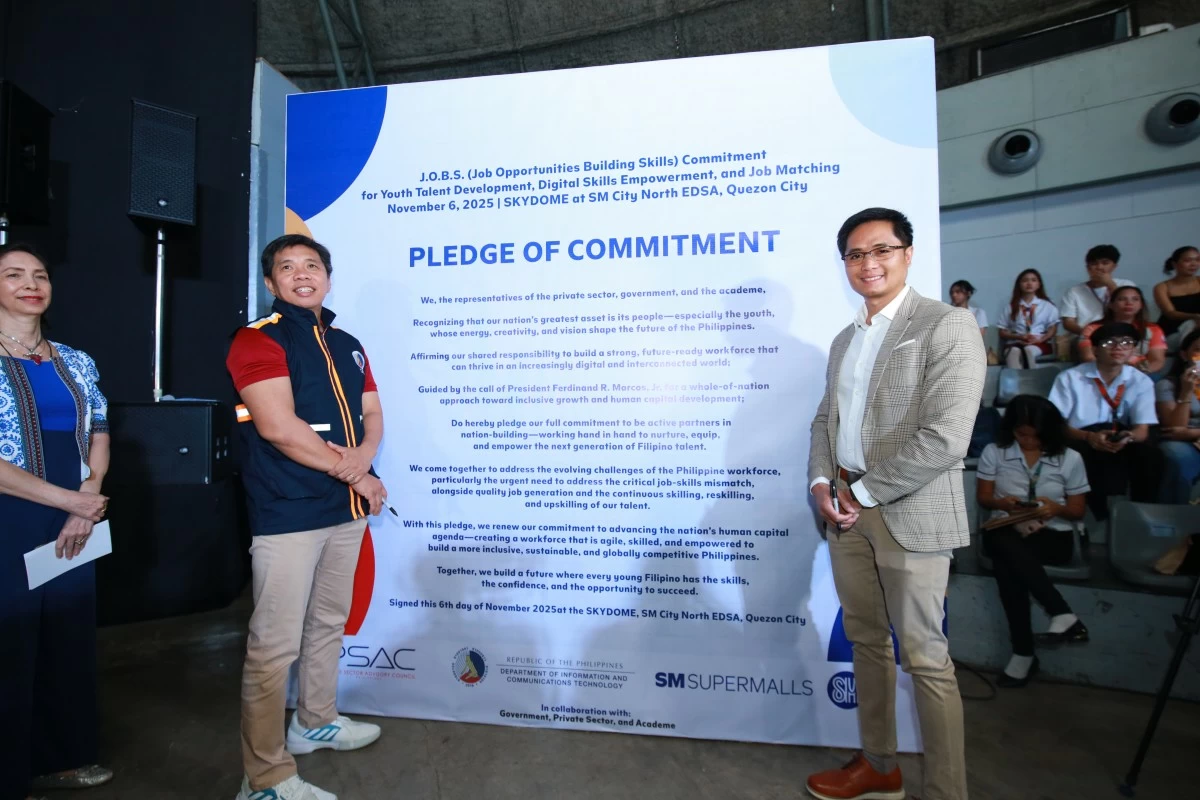 Department of Information and Communications Technology (DICT) Secretary Henry Aguda and SM Supermalls VP for Mall Operations Junias Eusebio formalize their partnership through a memorandum of understanding (MOU) to establish digital corners in SM Job Fairs. The two leaders also reaffirm their shared commitment through the Pledge of Commitment Wall, championing real-world opportunities that empower young Filipinos to develop future-ready digital skills.