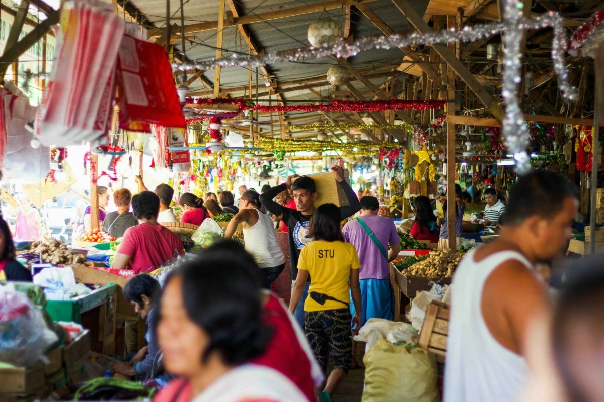 LOCAL BOUNTY A public market in Cebu bustles with early morning trade. (Photo from Unsplash)
