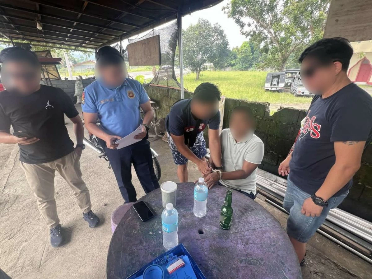 CIDG operatives serve the arrest warrant on "Nasser", a 54-year old barangay captain in Datu Salibo, in connection with the bomb attack in 2023 that left two barangay officials dead. (photo: CIDG) 