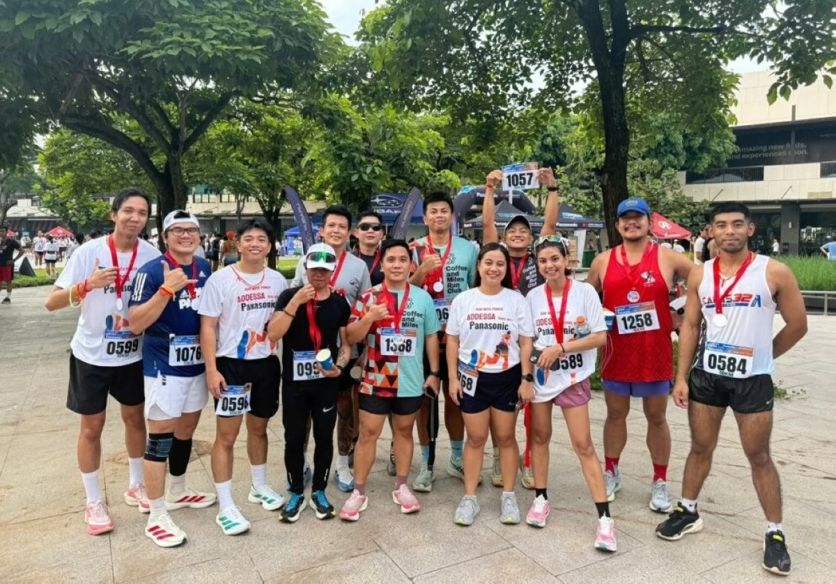 A few of the first 100 finishers for each category, proudly showing off their medals.
