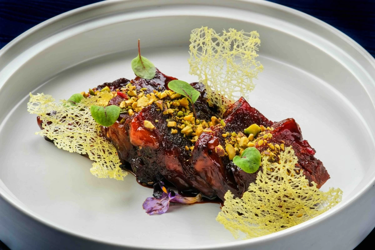 US premium beef short rib with honey sweet black vinegar sauce and pistachio
