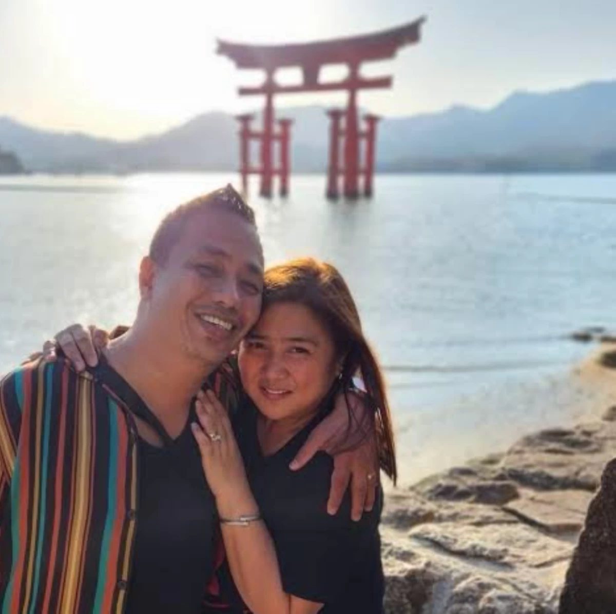 Eric and Ethel Nicolas at the iconic floating Torii Gate at Itsukushima Shrine in Miyajima, Japan. 
