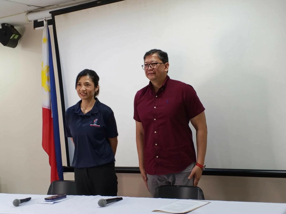 LOC committee gov’t relations head Belay Fernando, left, and PFF president John Gutierrez
