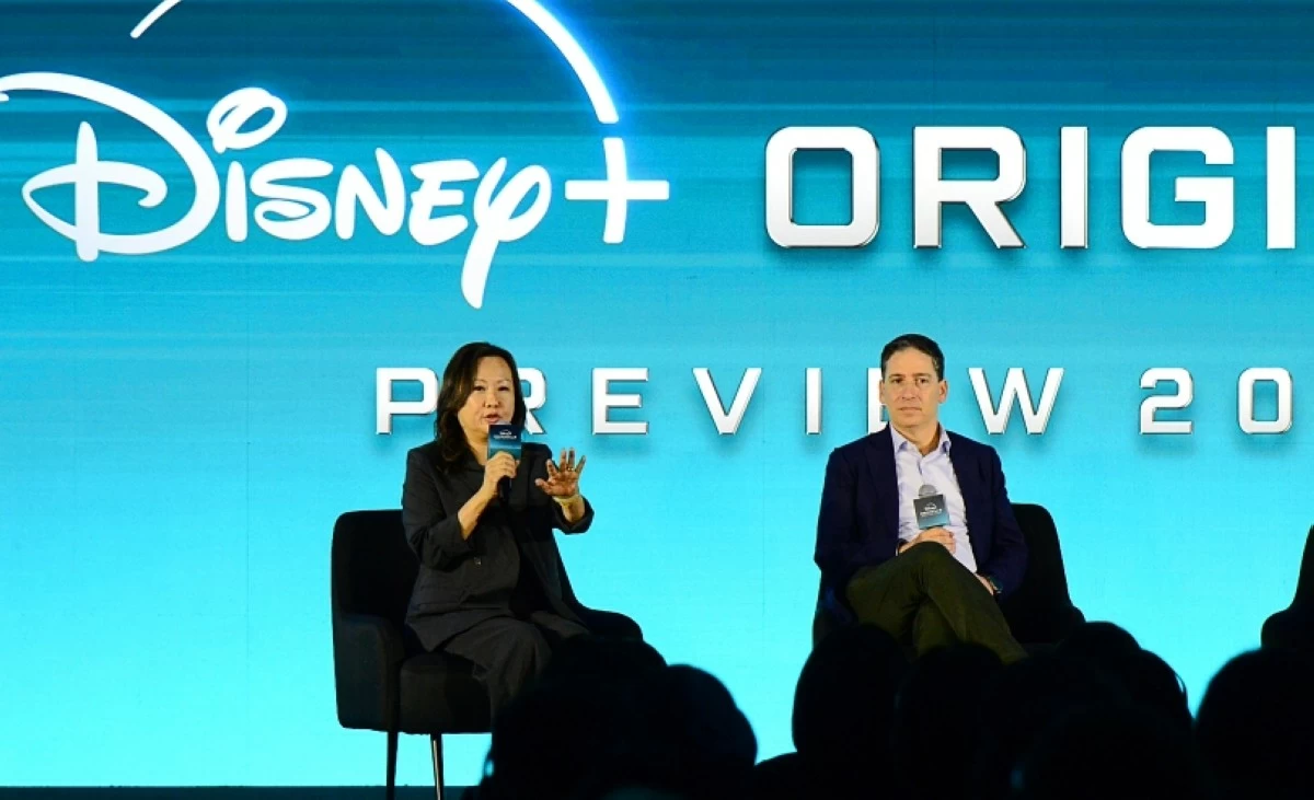 Eric Schrier (right), president of Disney Television Studios, and Carol Choi, executive vice president and head of APAC Original Content Strategy, discuss Disney  content during the Creative Conversation segment at the Disney  Originals Preview on Nov. 13 at the Hong Kong Disneyland Resort (Jonathan Hicap) 
