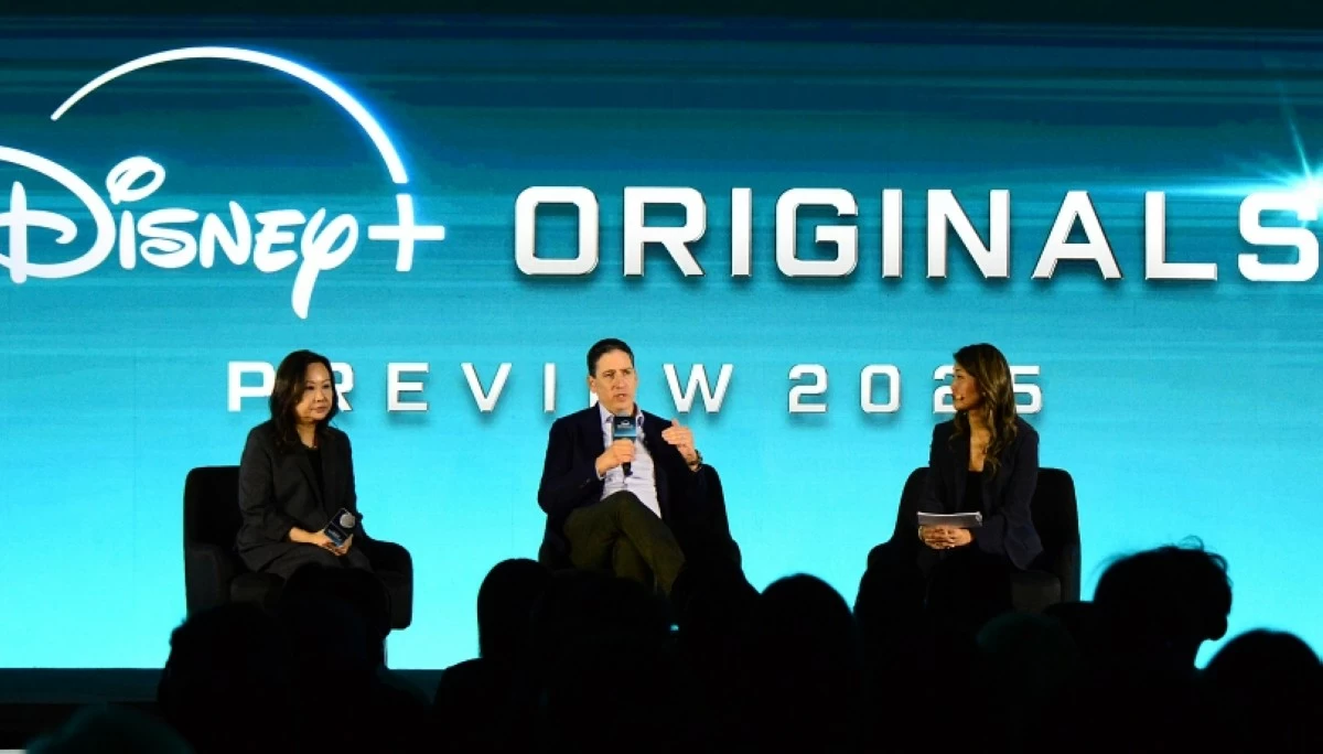 Eric Schrier (center), president of Disney Television Studios, and Carol Choi (left), executive vice president and head of APAC Original Content Strategy, at the Disney  Originals Preview on Nov. 13 at the Hong Kong Disneyland Resort (Jonathan Hicap) 
