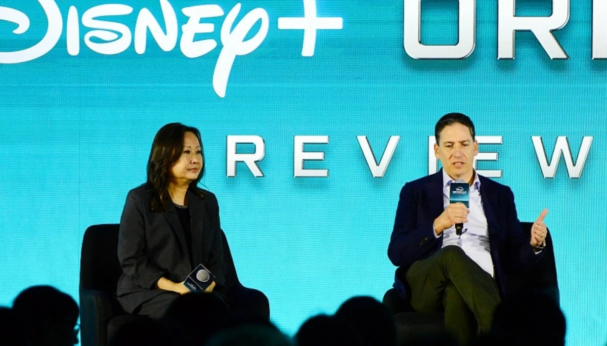 Eric Schrier (right), president of Disney Television Studios, and Carol Choi, executive vice president and head of APAC Original Content Strategy, discuss Disney  content during the Creative Conversation segment at the Disney  Originals Preview on Nov. 13 at the Hong Kong Disneyland Resort (Jonathan Hicap) 
