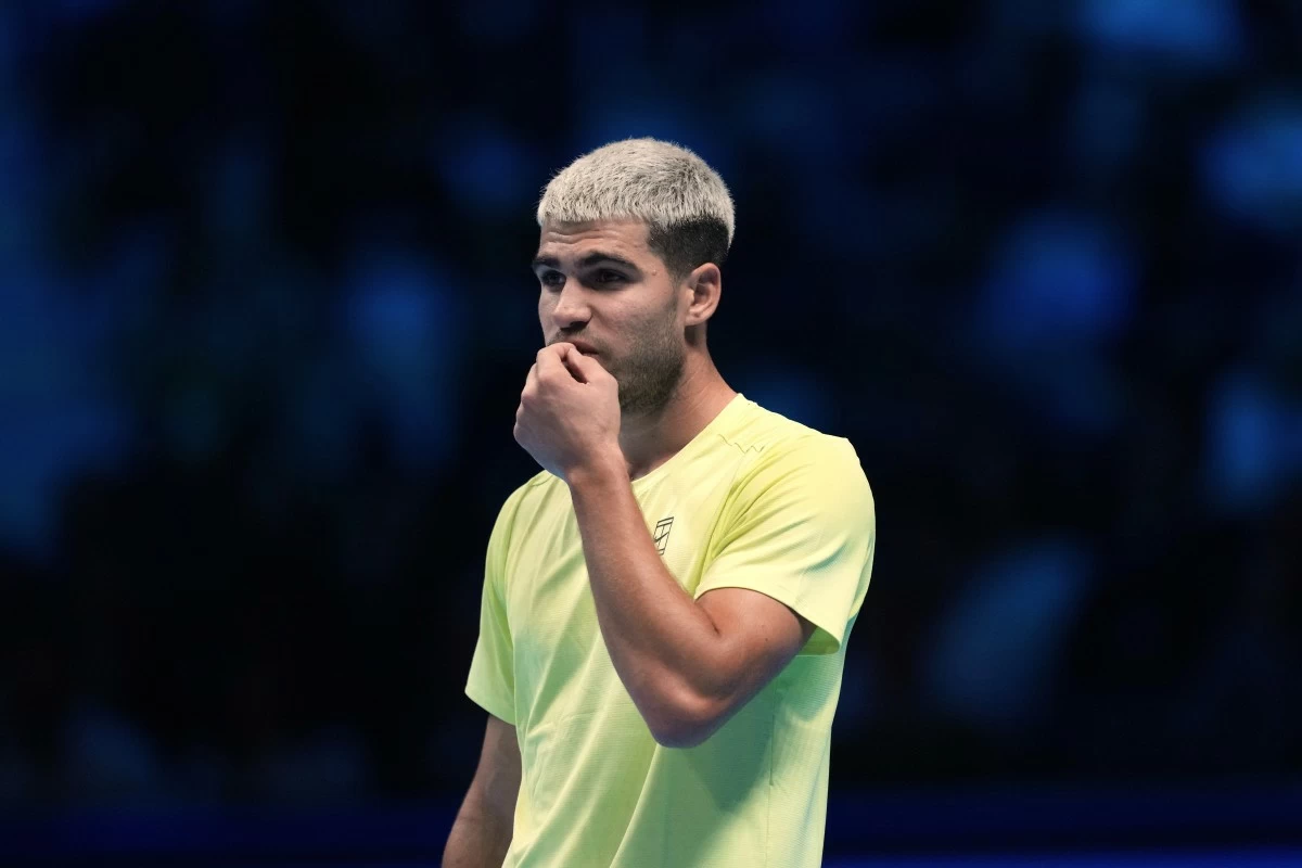 Spain's Carlos Alcaraz reacts during the tennis match of the ATP World Tour Finals against United States' Taylor Fritz, in Turin, Italy, Tuesday, Nov. 11, 2025. (AP Photo/Antonio Calanni)
