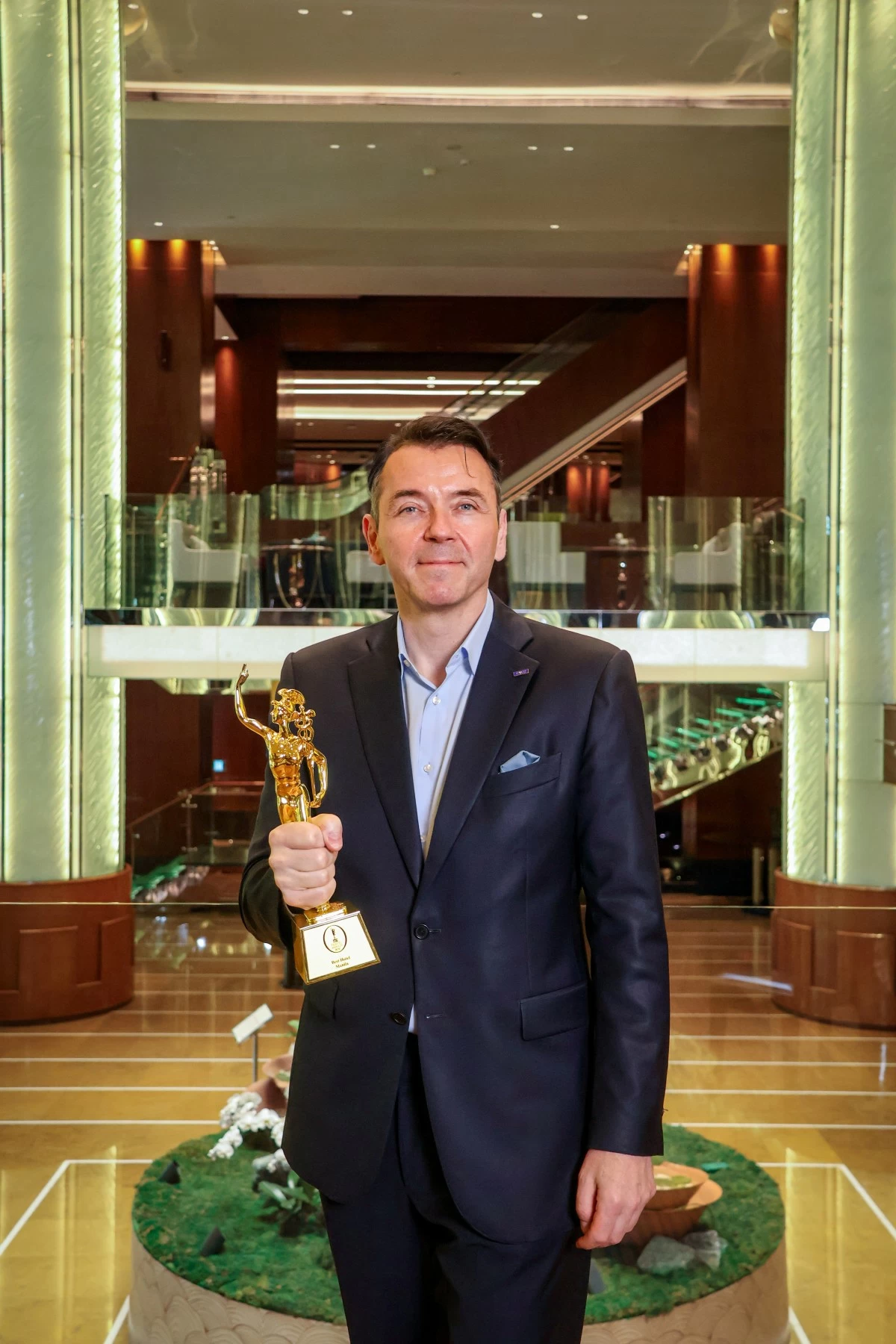 Roger Habermacher, General Manager of Grand Hyatt Manila, proudly holds the TTG Travel Awards trophy with the accolade for Best Hotel – Manila. The ceremony was held in September in Bangkok, Thailand 