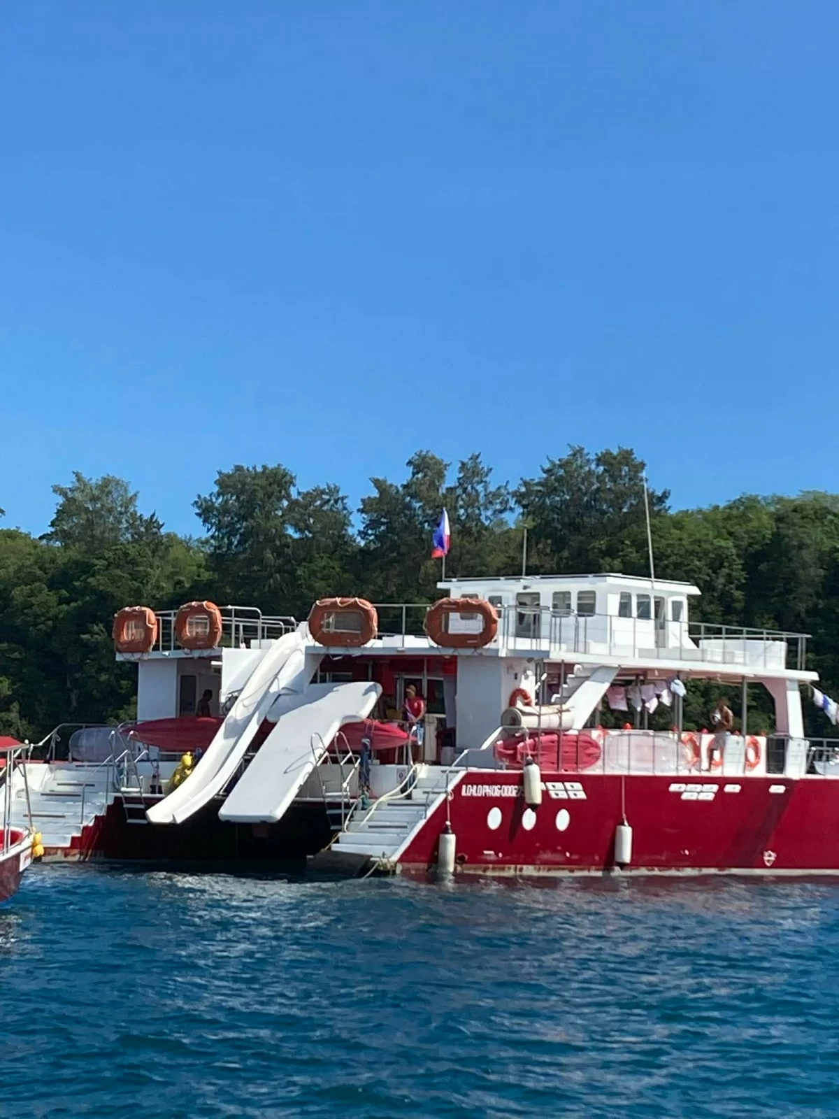 PARTY TIME Red Whale's party yacht experience lets you unwind and let loose with all the dancing, singing, and various activities throughout.