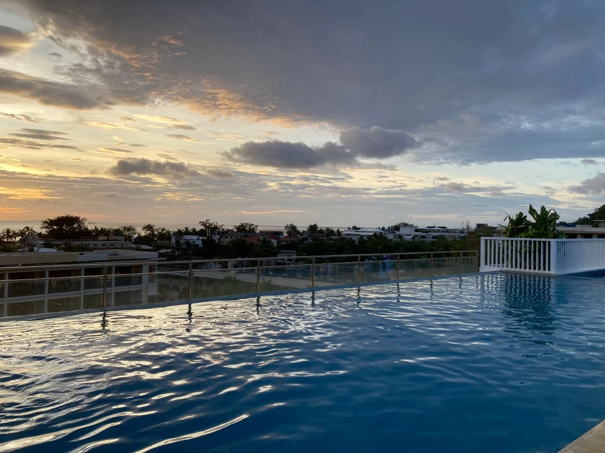 SUNSET VIEW The hotel's roofdeck pool offers a pleasant view of the sunset and the shoreline.