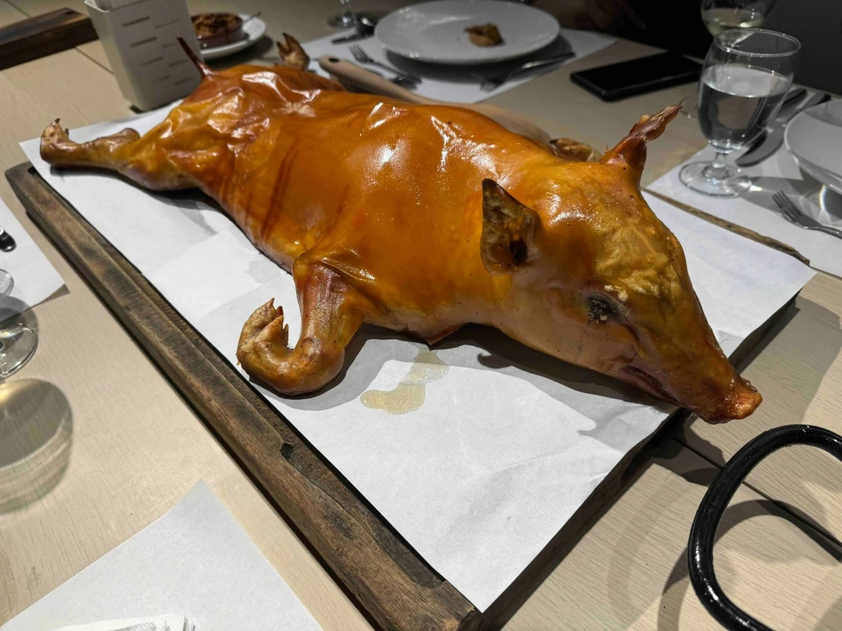 GOLDEN GLORY The cochinillo emerges from the oven in full shine, its skin crisp and deep golden brown