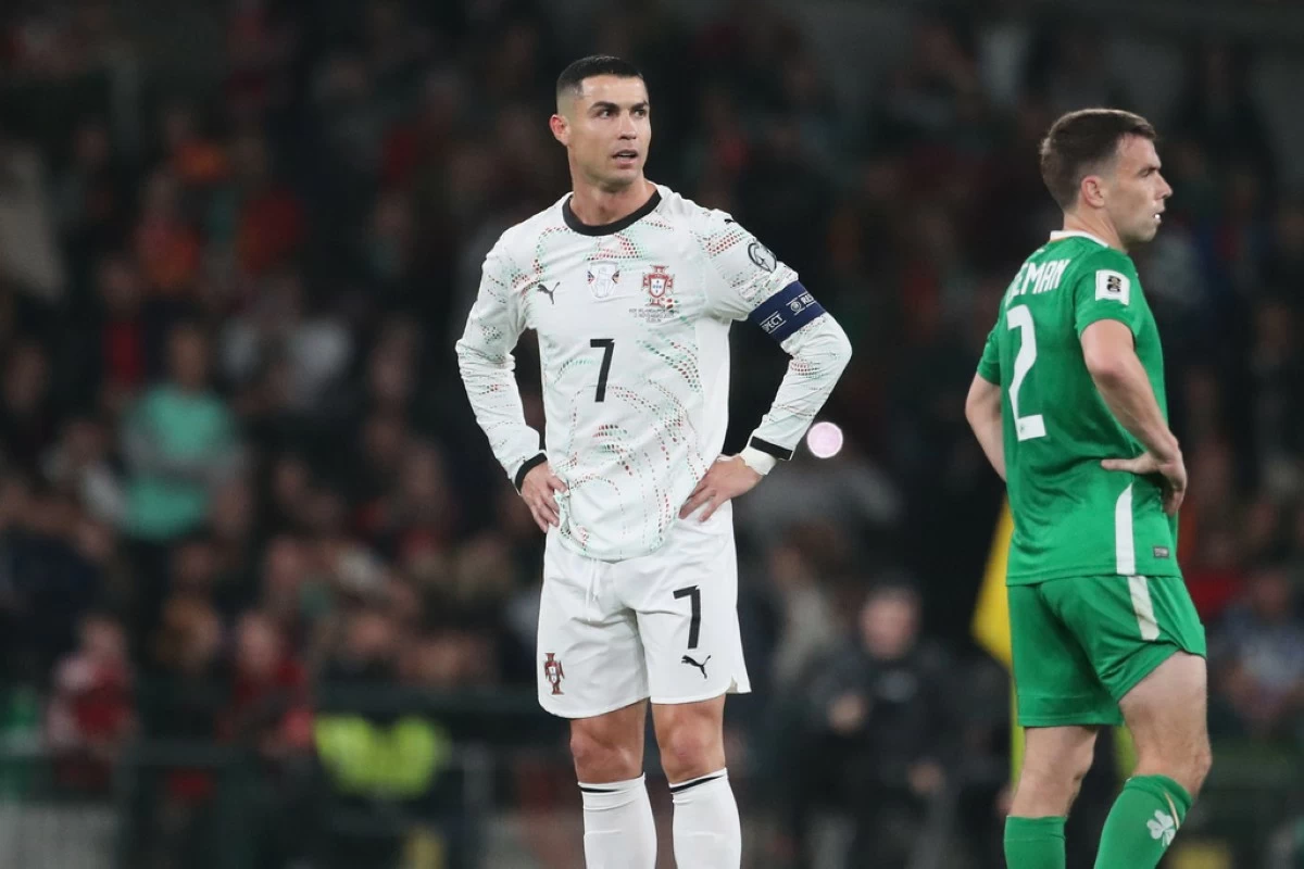 Portugal's Cristiano Ronaldo, center, reacts during a World Cup 2026 group F qualifying soccer match between Ireland and Portugal in Dublin, Thursday, Nov. 13, 2025. (AP Photo/Peter Morrison)