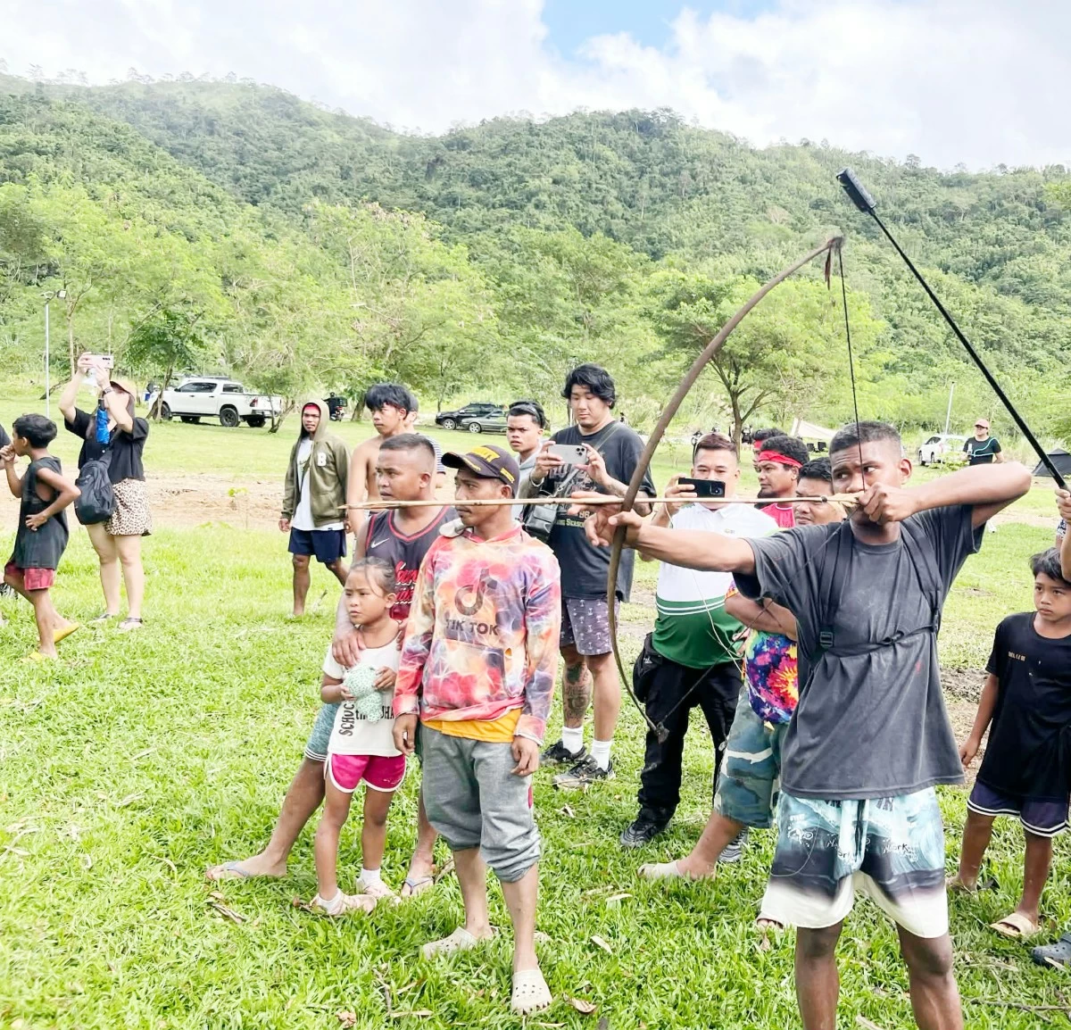 STRETCHING A HERITAGE — A Dumagat young man shows the art of archery. 
