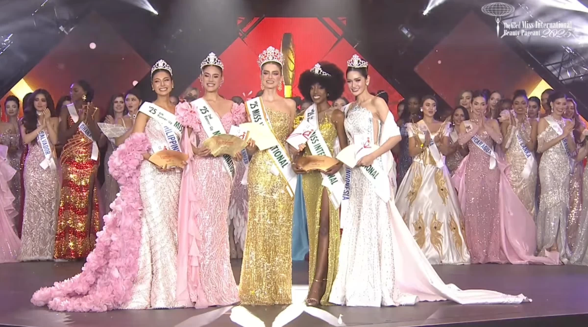 Miss International 2025 Catalina Duque of Colombia (center) and her court. (Images are screenshots from the Miss International 2025 beauty pageant streamed on YouTube)