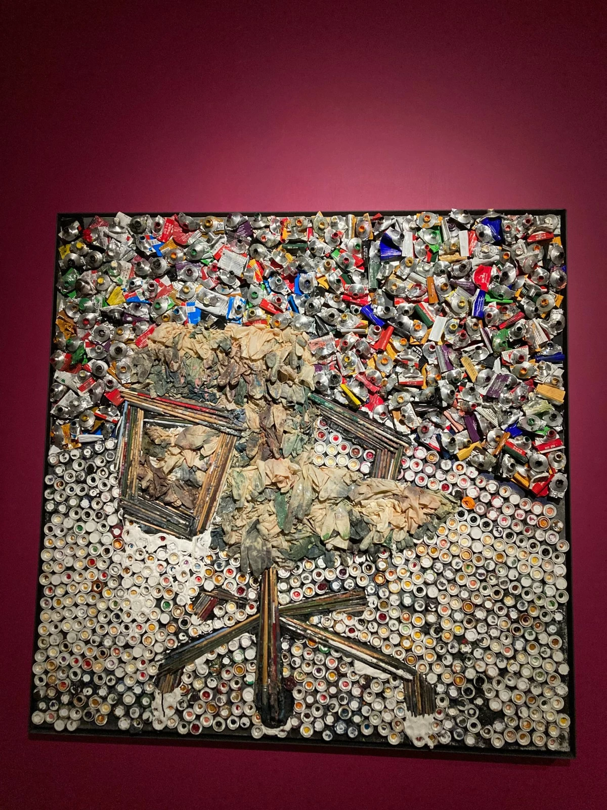 NO PIECE GOES TO WASTE This piece makes use of the discarded oil paint tubes, brushes, and gloves used in his work.