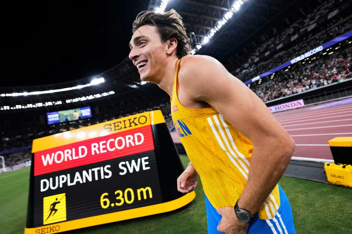 FILE - Sweden's Armand Duplantis is reacts after winning gold and setting a world record in the men's pole vault final at the World Athletics Championships in Tokyo, Monday, Sept. 15, 2025. (AP Photo/Ashley Landis,File)