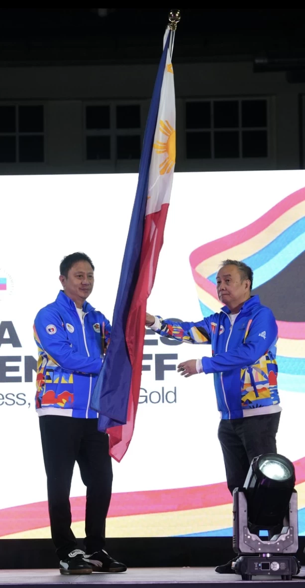 PHILIPPINE Olympic Committee president Abraham “Bambol” Tolentino and Philippine Sports Commission chairman Patrick “Patò” Gregorio are clad in the Thailand SEA Games version of the national track suit. (POC Photo)