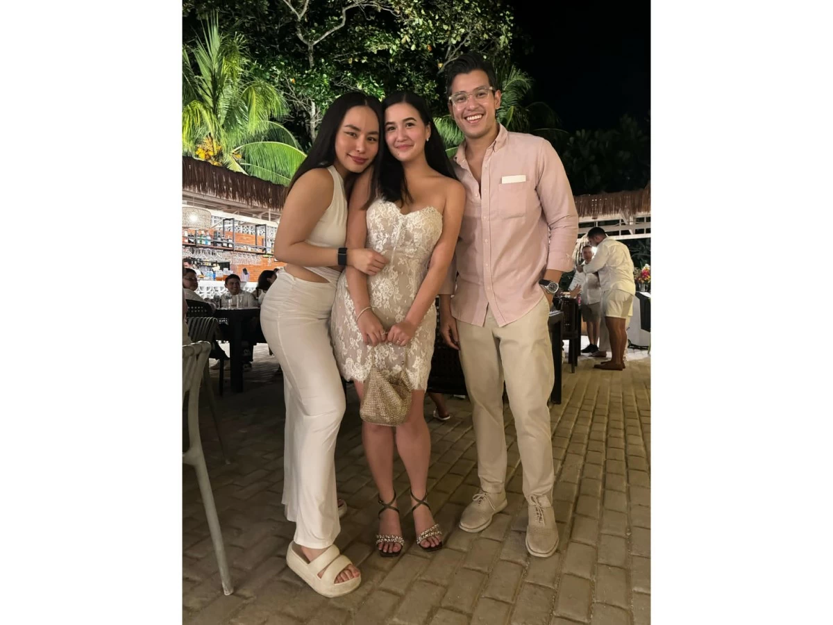 The author with the bride and groom at Day 1’s welcome dinner.

