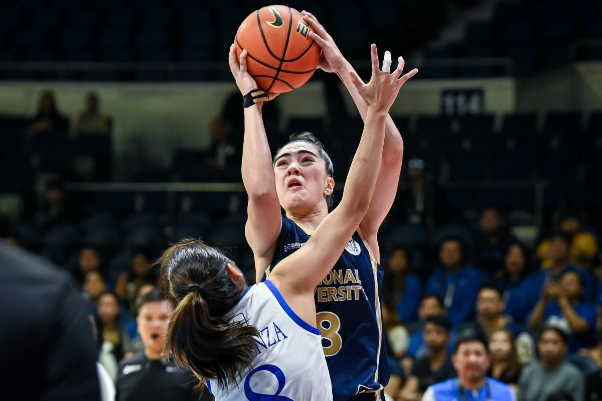 Angel Surada displays steely nerves as he caps off NU's come-from-behind win over Ateneo. (UAAP Media)