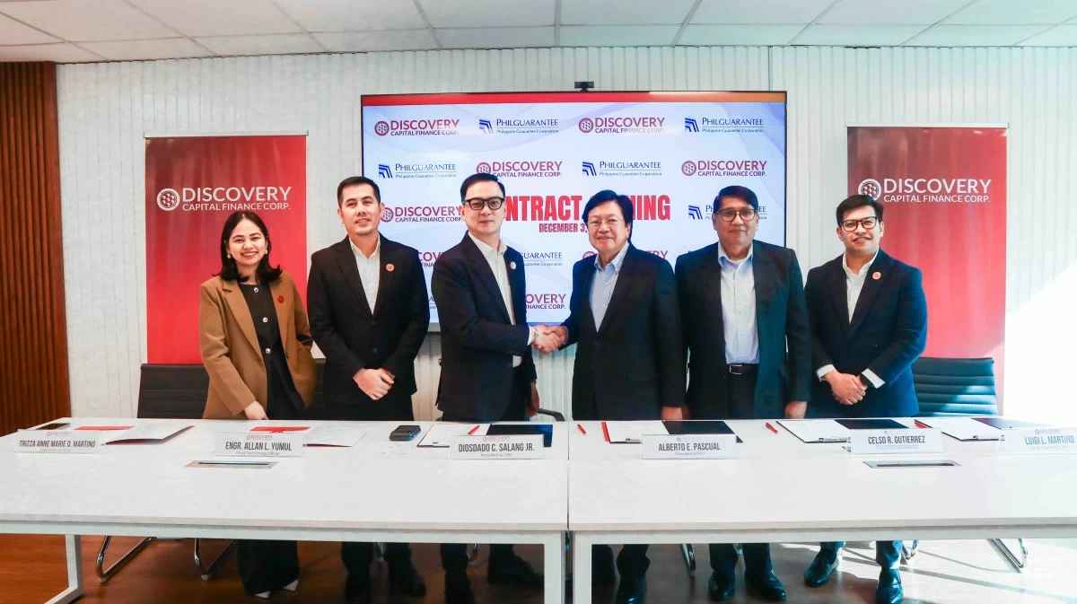 from left, Trizza Anne Marie D. Martino, Discovery CFO; Allan L. Yumul, Discovery CTO; Diosdado C. Salang, Jr., Discovery President & CEO; Alberto E. Pascual, PHILGUARANTEE President & CEO; Celso R. Gutierrez, PHILGUARANTEE Senior Vice President/Group Head, Priority Sectors Guarantee Group; and Luigi Martin L. Martino, Discovery CTO, during the signing of the strategic partnership between Discovery Capital Finance Corporation and PHILGUARANTEE to expand nationwide SME financing. Trizza Anne Marie D. Martino, Discovery CFO; Allan L. Yumul, Discovery CTO; Diosdado C. Salang, Jr., Discovery President & CEO; Alberto E. Pascual, PHILGUARANTEE President & CEO; Celso R. Gutierrez, PHILGUARANTEE Senior Vice President/Group Head, Priority Sectors Guarantee Group; and Luigi Martin L. Martino, Discovery CTO, during the signing of the strategic partnership between Discovery Capital Finance Corporation and PHILGUARANTEE to expand nationwide SME financing.  
