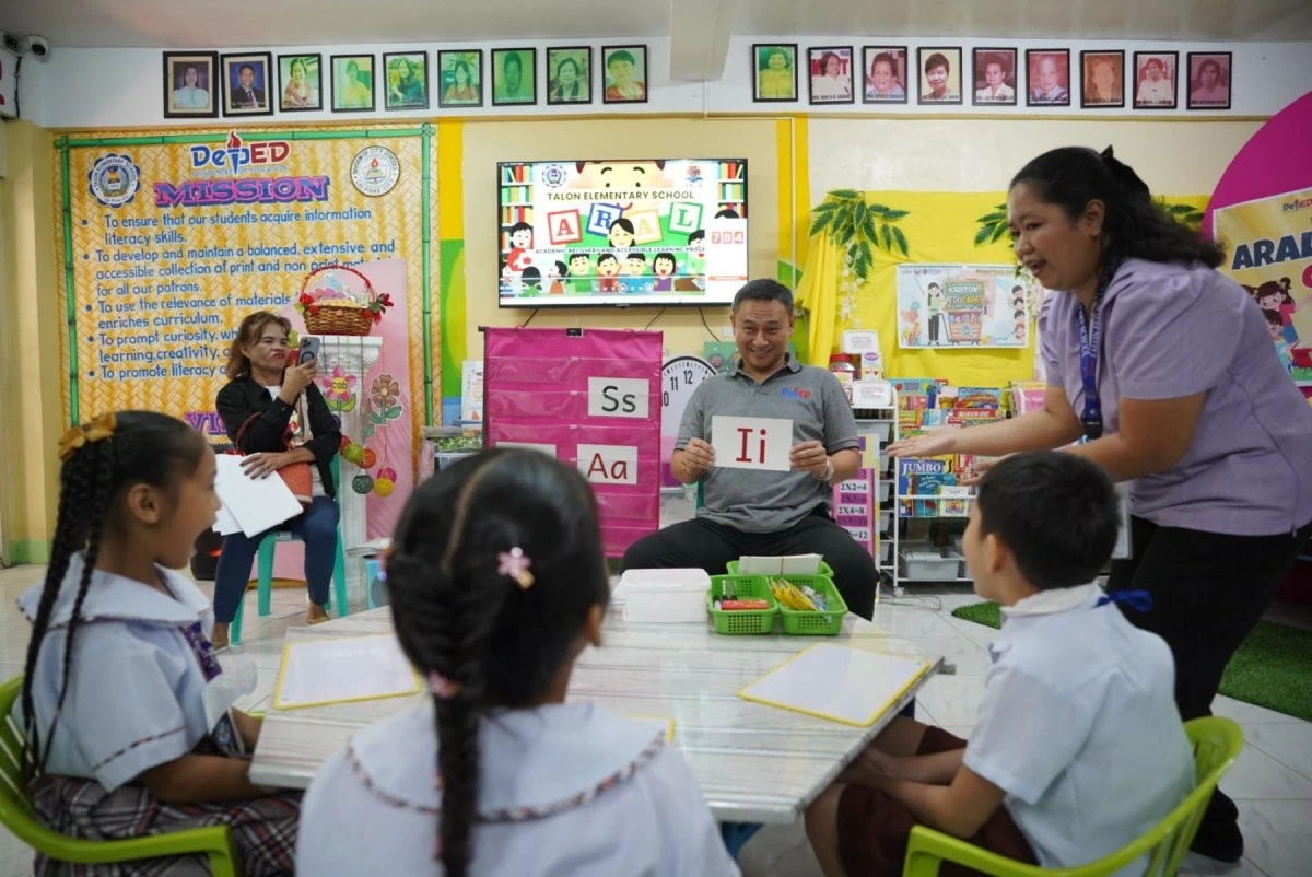 Angara pushes for strong tutor-learner ratios and community support boosting reading outcomes at Talon ES. (Photo from DepEd)