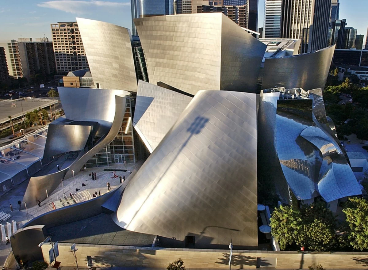 This Oct. 20, 2003 file photo shows early morning sun illuminating the new Walt Disney Concert Hall in downtown Los Angeles. (AP Photo/Nick Ut, file)