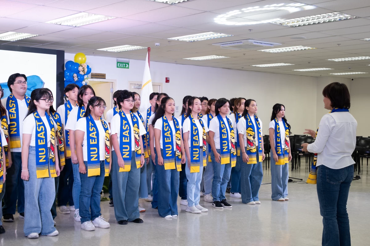 The NU East Ortigas' Novia Solaria Choir sings the National Anthem at the NUEO's 1st Anniversary celebration
