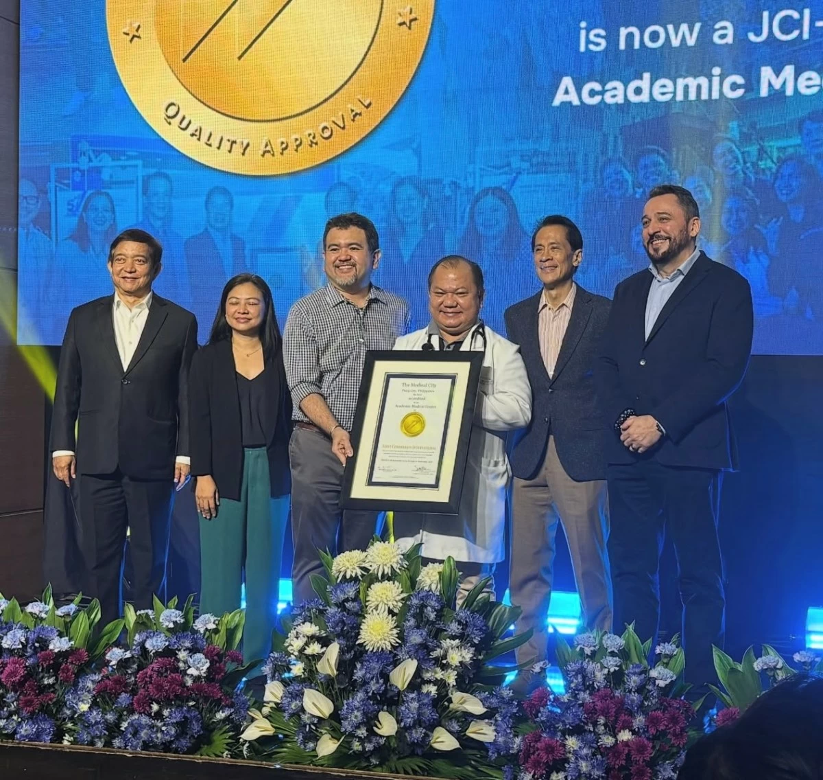 At The Medical City 58th Anniversary, from left to right - Dr. Ruben Kasala, Ms. Lilibeth Manlulu, Dr. Karl Henson, Dr. Raul Destura, TMC Chairman Jose Xavier Gonzales, and Dr. Stuart Bennett; with its’ JCI-accreditation as an Academic Medical Center, and certification for its Primary Stroke Program. 