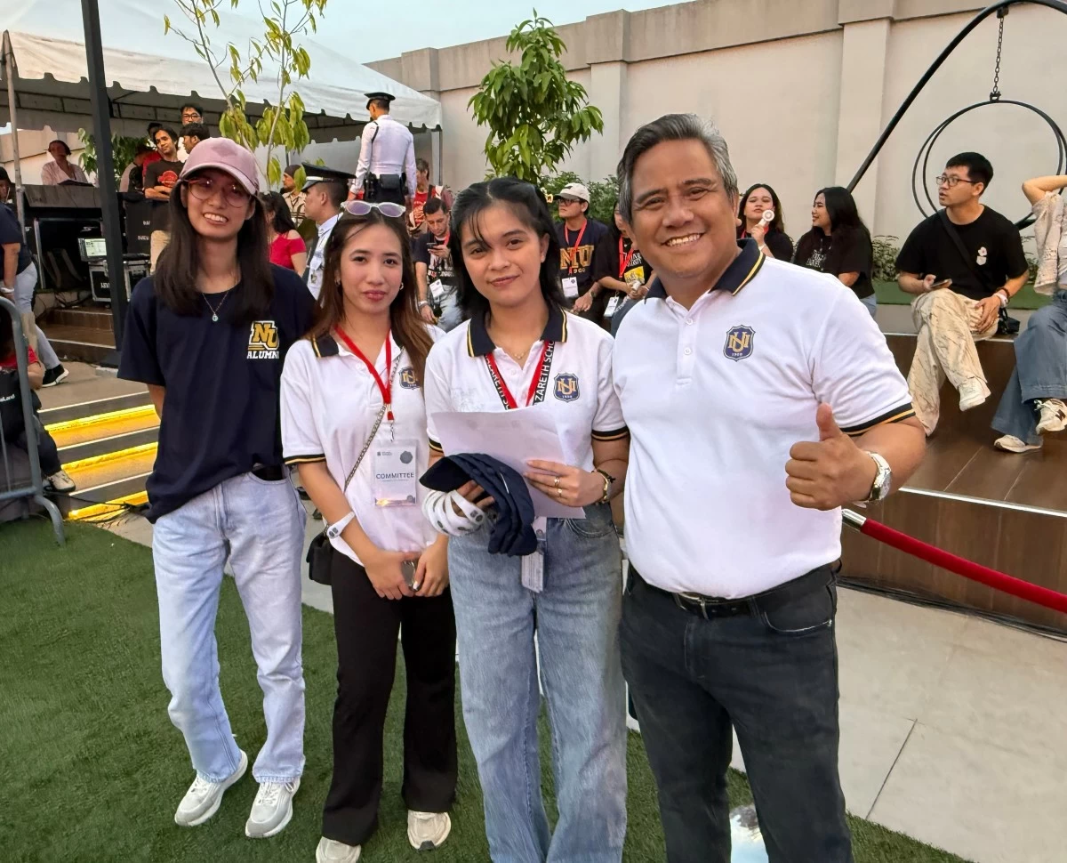 Adolfo Aran, NU senior director of Marketing and Communications, with his team
