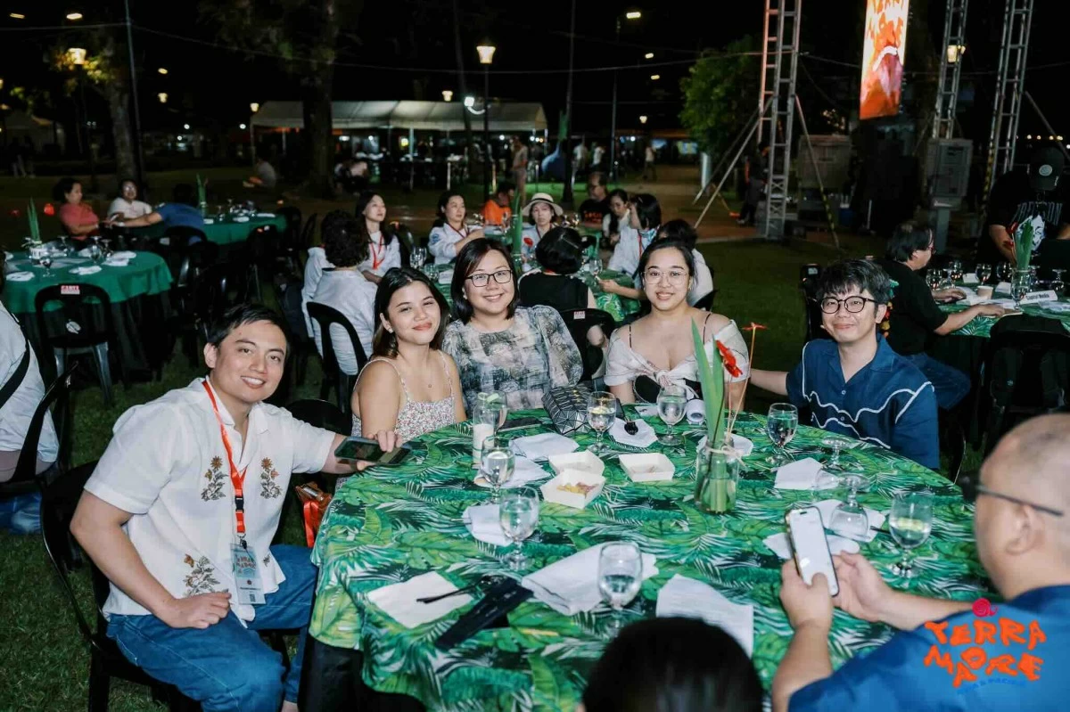 PRESS PASS The author joins fellow media delegates at the Terra Madre Asia and Pacific grounds, capturing stories and moments from the weeklong gathering in Bacolod.