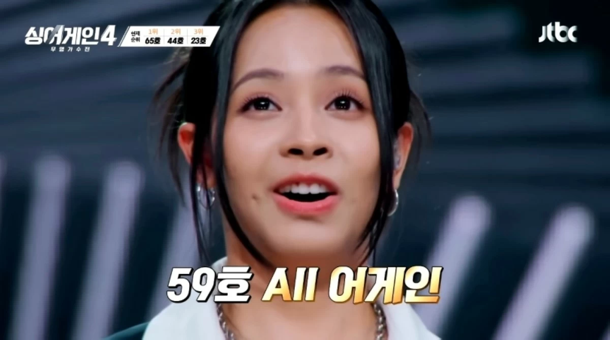 Gwyn Dorado reacts after getting the votes from all the judges (Screenshot from JTBC Music video on YouTube) 
