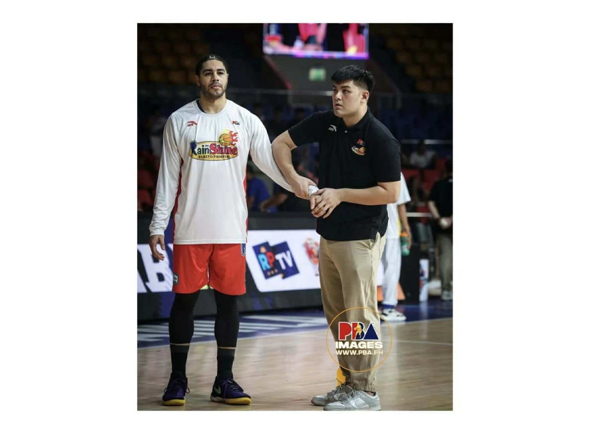 ETHAN CASARES (right) with Rain or Shine import Aaron Fuller