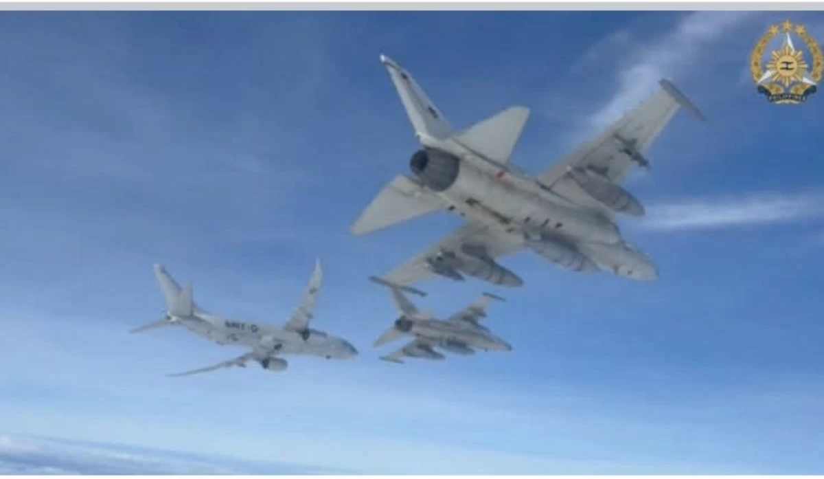 A Philippine Air Force FA-50 provides aerial escort to a US Navy P-8A Poseidon during the routine maritime patrol operations during the conduct of the 9th Bilateral Maritime Cooperative Activity (MCA) in the West Philippine Sea. (photo: AFP)