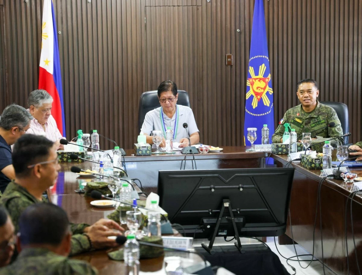 President Ferdinand Marcos Jr. (center) is briefed by Armed Forces of the Philippines (AFP) Chief of Staff, Gen. Romeo Brawner Jr. (right) on the operational progress of the Eastern Mindanao Command (Eastmincon) during his visit to the Naval Station Felix Apolinario in Panacan, Davao City on Dec. 4, 2025. (Photo: AFP)  